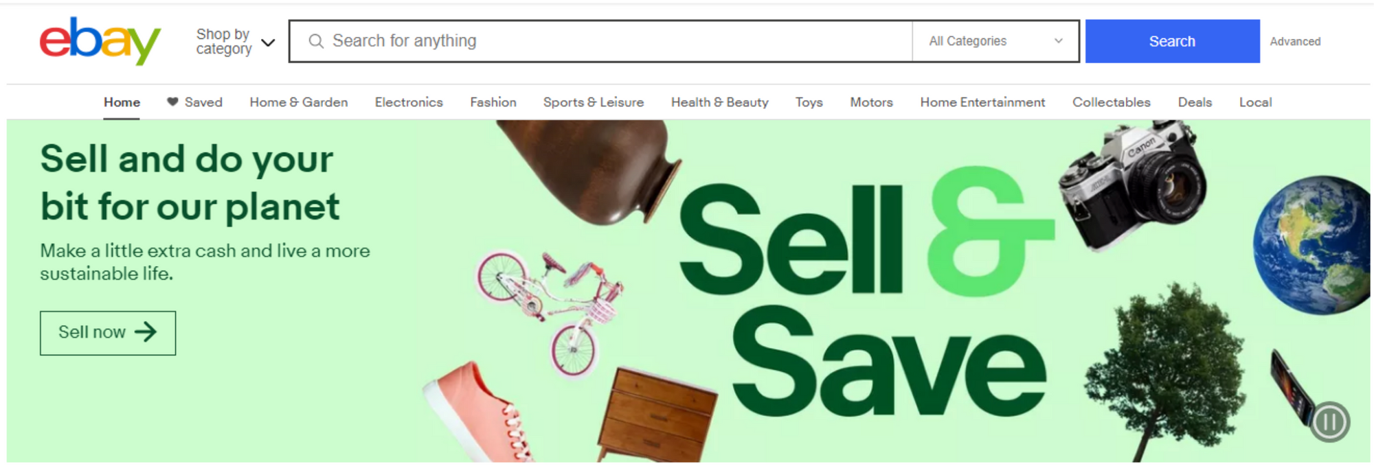 eBay homepage with search bar, category menu and a "Sell & Save" banner